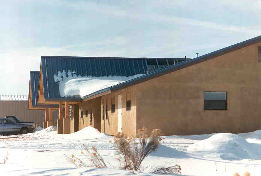 after renovaton - pitched roof entries keep paths clear for entry